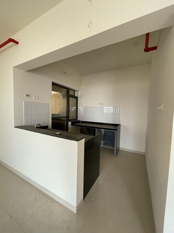Kitchen in 4 BHK Apartment at Shapoorji Pallonji Vanaha Golfland, Bavdhan – for Rent