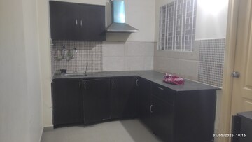 Kitchen in 3 BHK Apartment at Modi Mayflower Grande, Mallapur – for Rent