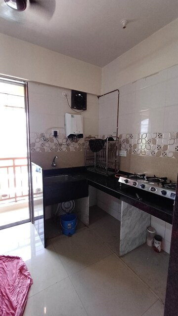 Kitchen in 2 BHK Apartment at Gaurang Tulsi Vrindavan CHS, Naupada – for Rent