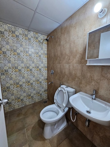Bathroom in 3 BHK Apartment at Bhartiya Nikoo Homes Phase 2, Thanisandra Main Road – for Rent