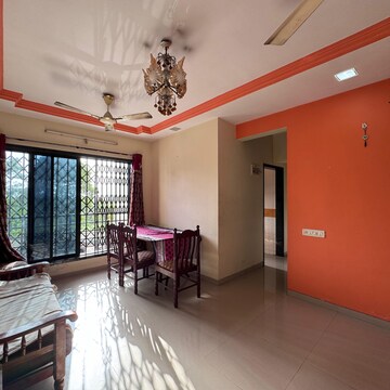 Living Room in 2 BHK Apartment at Vasai West – for Sale