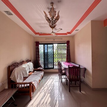 Living Room in 2 BHK Apartment at Vasai West – for Sale