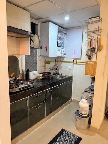 Kitchen in 1 BHK Apartment at VVIP Homes Meridian Tower, Sector 4 Greater Noida – for Rent