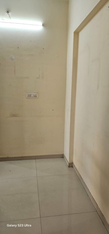 Master Bedroom in 1 BHK Apartment at Bhoomi Acres, Waghbil – for Rent
