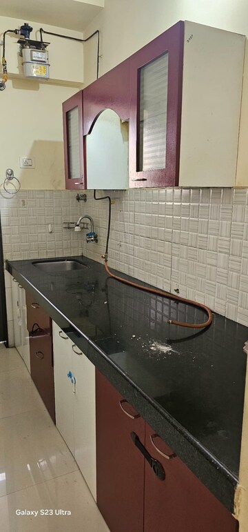 Kitchen in 1 BHK Apartment at Bhoomi Acres, Waghbil – for Rent