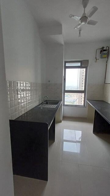 Kitchen in 2 BHK Apartment at Kalpataru Immensa, Kolshet Road – for Rent