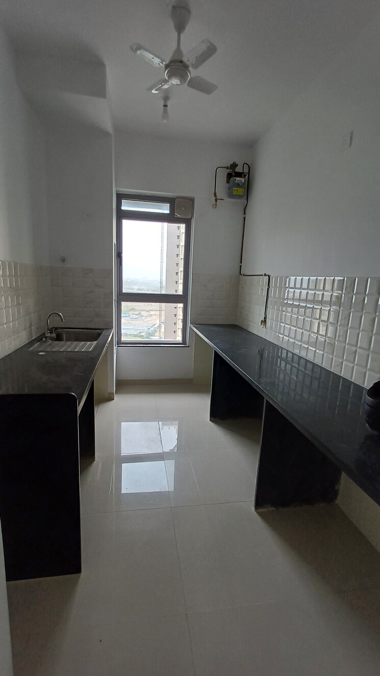 Kitchen, kalpataru-immensa 2 Bedroom 599 Sq.Ft. Apartment In Kolshet Road Thane 8765157
