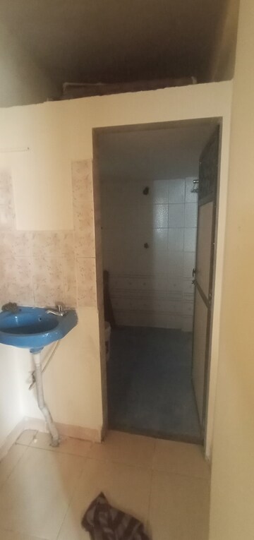 Bathroom in 1 BHK Apartment at Rajaram CHS, Dombivli East – for Rent