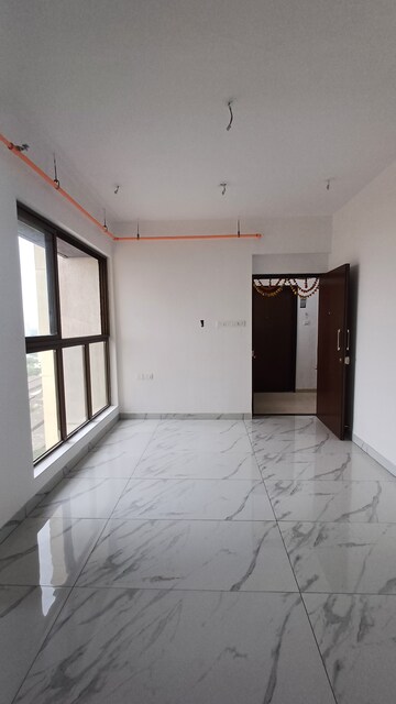 Living Room in 1 BHK Apartment at Raymond Ten X Vibes, J K Gram – for Rent