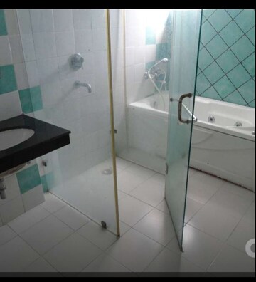Bathroom in 3.5 BHK Apartment at Omaxe Heights II, Gomti Nagar – for Rent