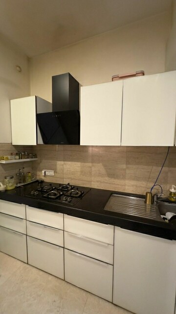 Kitchen in 2 BHK Apartment at Omkar Apartment Malad East, Malad East – for Rent