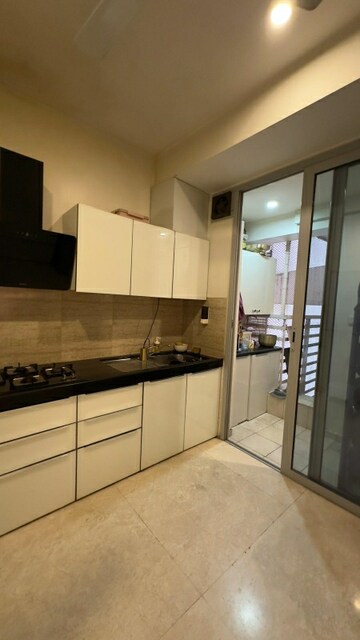 Kitchen in 2 BHK Apartment at Omkar Apartment Malad East, Malad East – for Rent