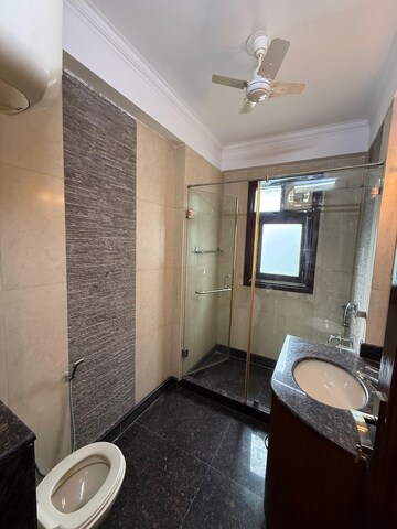 Bathroom in 3 BHK Builder Floor at Pamposh Enclave – for Rent