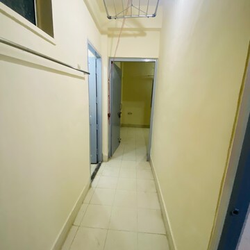 Building Lobby in 2 BHK Apartment at Aashiyana CHS, Sion – for Rent