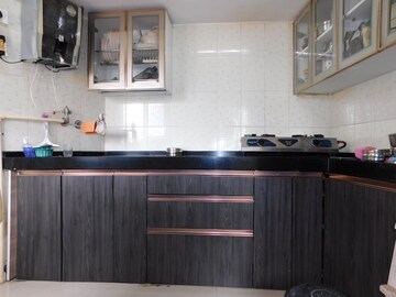 Kitchen in 1 BHK Apartment at Shastri Hall, Grant Road – for Sale