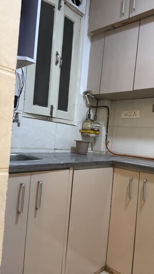 Kitchen in 2 BHK Builder Floor at Shakti Khand 2 – for Sale