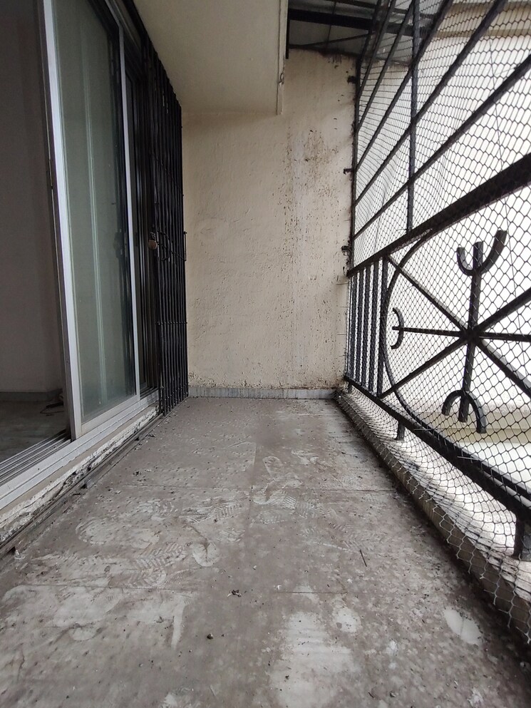 Balcony, channel-classic-chs 2 Bedroom 650 Sq.Ft. Apartment In Kopar Khairane Navi Mumbai 8765445