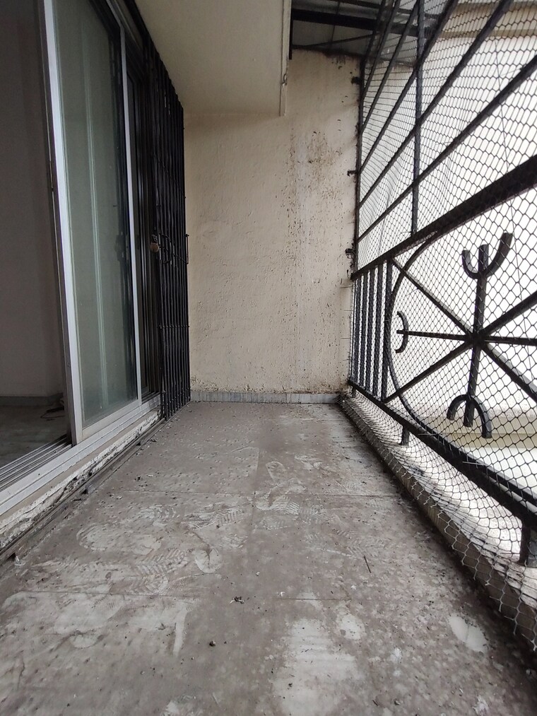 Balcony, channel-classic-chs 2 Bedroom 650 Sq.Ft. Apartment In Kopar Khairane Navi Mumbai 8765445