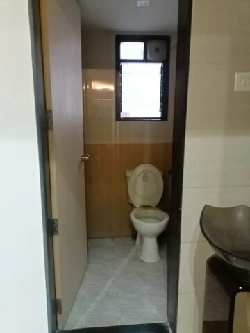 Bathroom in 2 BHK Apartment at Raviraj Camellia, Wanwadi – for Rent