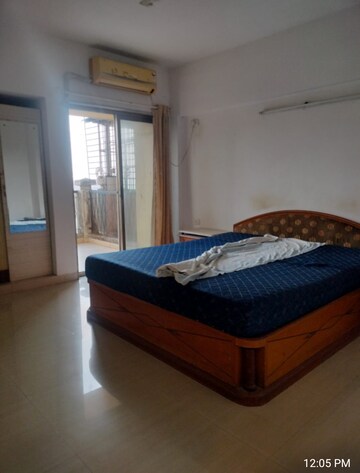 Bedroom in 3 BHK Apartment at NRI Complex Phase 2, Seawoods – for Rent