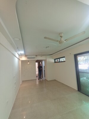 Living Room in 2 BHK Apartment at Lodha Palava City Lakeshore Greens, Dombivli East – for Sale