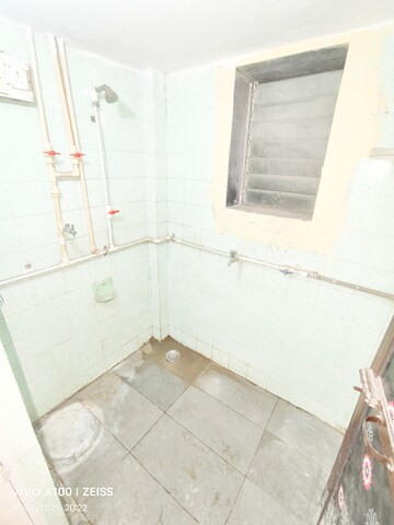 Bathroom in 1 RK Apartment at Madhumalati CHS, Kalwa – for Rent