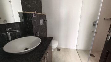 Bathroom in 3 BHK Apartment at Mahagun Mezzaria, Sector 78 – for Rent