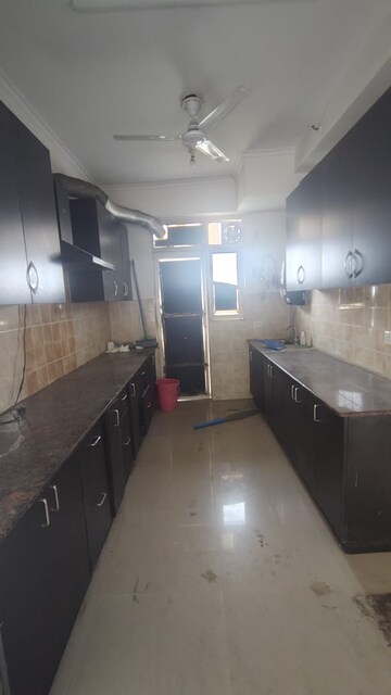 Kitchen in 2 BHK Apartment at Nimbus The Hyde park, Sector 78 – for Sale