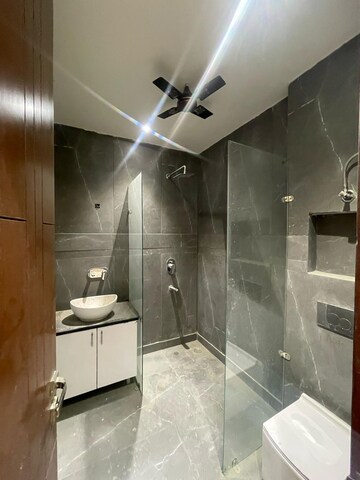 Bathroom in 4 BHK Builder Floor at Niti Khand I – for Sale