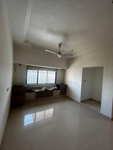 Room in 2 BHK Apartment at Unique Twins Tower CHS, Kharghar Sector 20 – for Rent