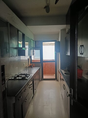 Kitchen in 3 BHK Apartment at Krishna Villa Sector 16B, Sector 16b Greater Noida – for Rent