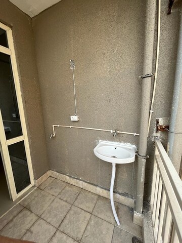 Bathroom in 2 BHK Apartment at Conscient Habitat 78, Sector 78 – for Sale