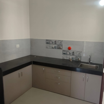 Kitchen in 2 BHK Apartment at Regency Astra, Veerabhadra Nagar – for Sale