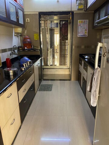 Kitchen in 2 BHK Apartment at Regency Estate, Dombivli East – for Sale