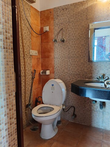 Bathroom in 2 BHK Apartment at Jaipuria Sunrise Greens, Ahinsa Khand 1 – for Rent
