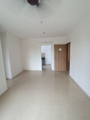 Living Room in 1.5 BHK Apartment at Lodha Palava Casa Rio Caspiana, Dombivli East – for Sale