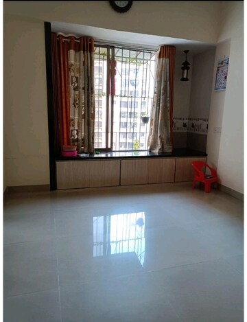 Living Room in 1 BHK Apartment at Runwal Garden City, Balkum Pada – for Sale