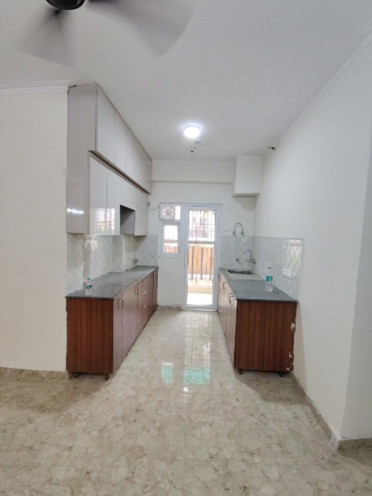 Kitchen, amrapali-centurian-park-phase-ii 3 Bedroom 1400 Sq.Ft. Apartment In Tech Zone 4 Greater Noida Greater Noida 8766467