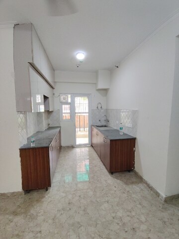 Kitchen in 3 BHK Apartment at Amrapali Centurian Park Phase II, Tech Zone 4 Greater Noida – for Rent