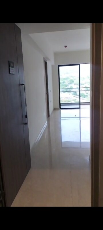 Building Lobby in 2 BHK Apartment at Lodha Woods, Kandivali East – for Sale