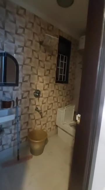 Bathroom in 3 BHK Builder Floor at Mahavir Enclave – for Sale