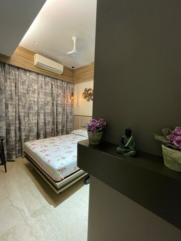 Living Room in 4 BHK Apartment at Oberoi Realty Esquire, Goregaon East – for Sale