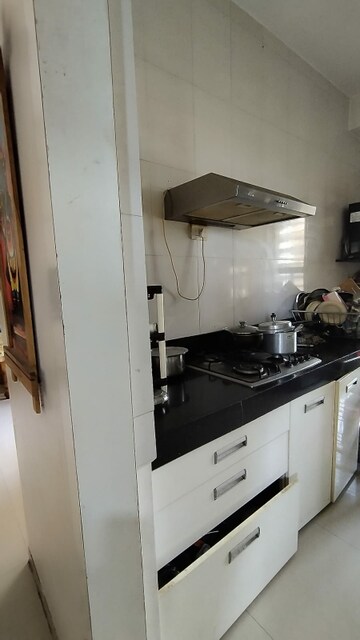 Kitchen in 2.5 BHK Apartment at Punarvasu Building, Mira Road – for Sale
