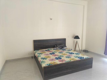 Bedroom in 4 BHK Builder Floor at Ansal API Esencia, Sector 67 – for Rent