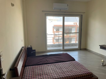 Bedroom in 4 BHK Builder Floor at Ansal API Esencia, Sector 67 – for Rent