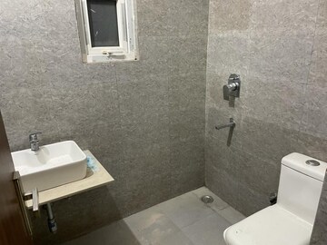 Bathroom in 4 BHK Builder Floor at Ansal API Esencia, Sector 67 – for Rent