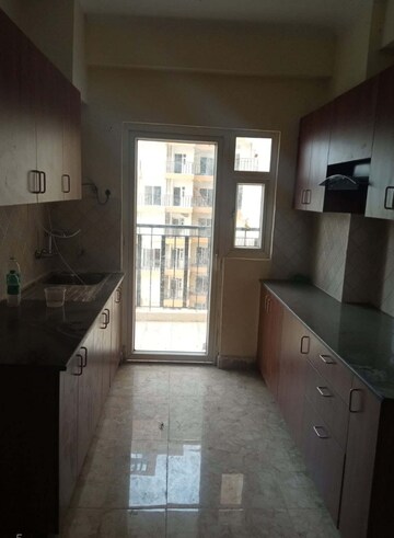 Kitchen in 3 BHK Apartment at Amrapali Centurian Park, Tech Zone 4 Greater Noida – for Rent
