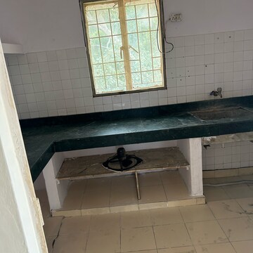 Kitchen in 2 BHK Apartment at RWA Apartments Sector 21, Arun Vihar – for Rent