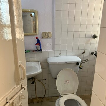 Bathroom in 2 BHK Apartment at RWA Apartments Sector 21, Arun Vihar – for Rent