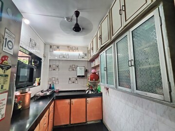 Kitchen in 2 BHK Apartment at Amrapali CHS Andheri, Andheri East – for Sale